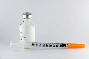 A syringe with a drug vial