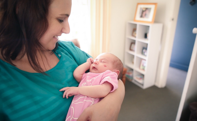 mother looking at her daughter